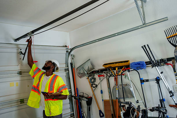 Professional Garage Door Roller Replacement technician working in Iowa City, IA